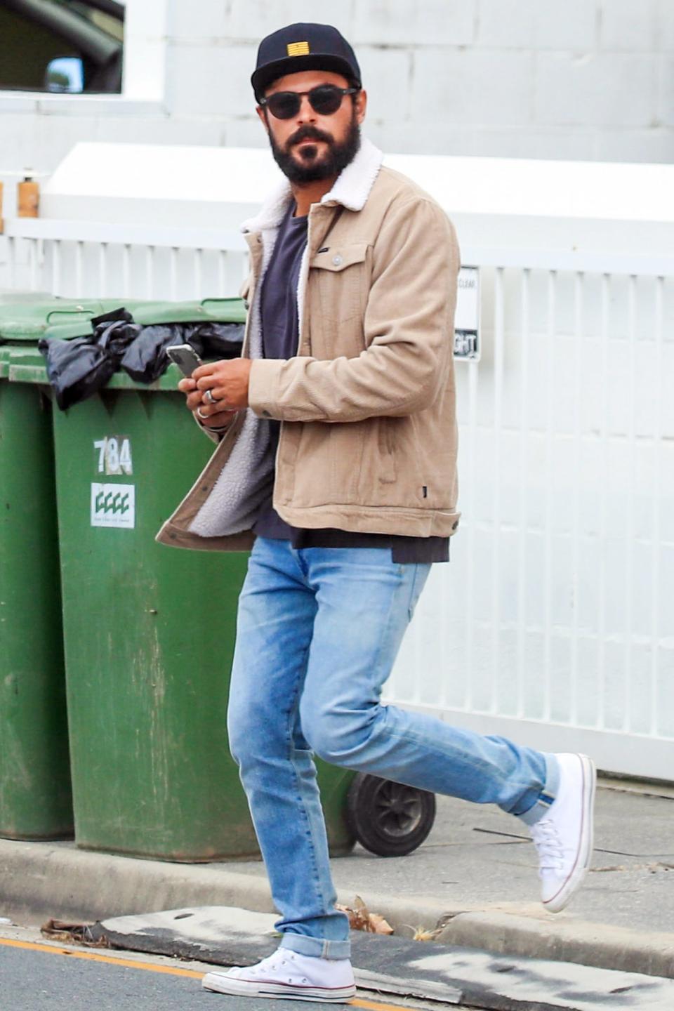 <p>Zac Efron steps out after a lunch date with girlfriend Vanessa Valladares on Wednesday in Byron Bay, Australia. </p>