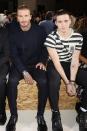 Supporting their fashion queen Victoria Beckham at her show, hubby David and son Brooklyn were sitting front and centre.