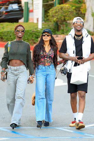 <p>Rachpoot/Bauer-Griffin/GC Images</p> Jodie Turner Smith, Nancy Gomez and Richard Smith go for a stroll in Los Angeles