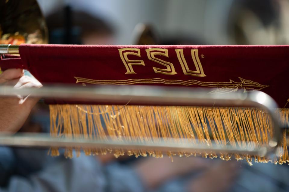 Members of the Florida State Marching Chiefs  perform in the Capitol courtyard during FSU Day at the Capitol on Tuesday, March 21, 2023. 