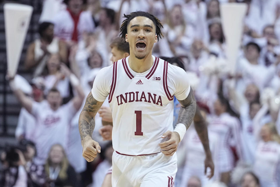 CORRECTS CITY TO BLOOMINGTON, INSTEAD OF INDIANAPOLIS - Indiana guard Jalen Hood-Schifino (1) reacts after a score against North Carolina during the first half of an NCAA college basketball game in Bloomington, Ind., Wednesday, Nov. 30, 2022. (AP Photo/Darron Cummings)