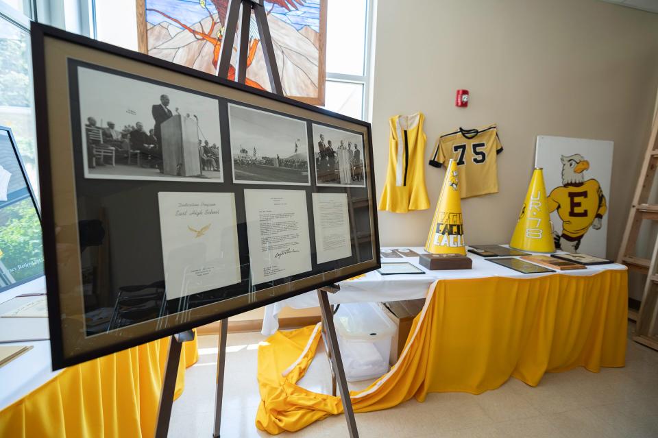 Photographs and letters from the Pueblo East High School dedication ceremony and other items are on display at the school's Alumni and Heritage Hall on Wednesday, May 10, 2023.