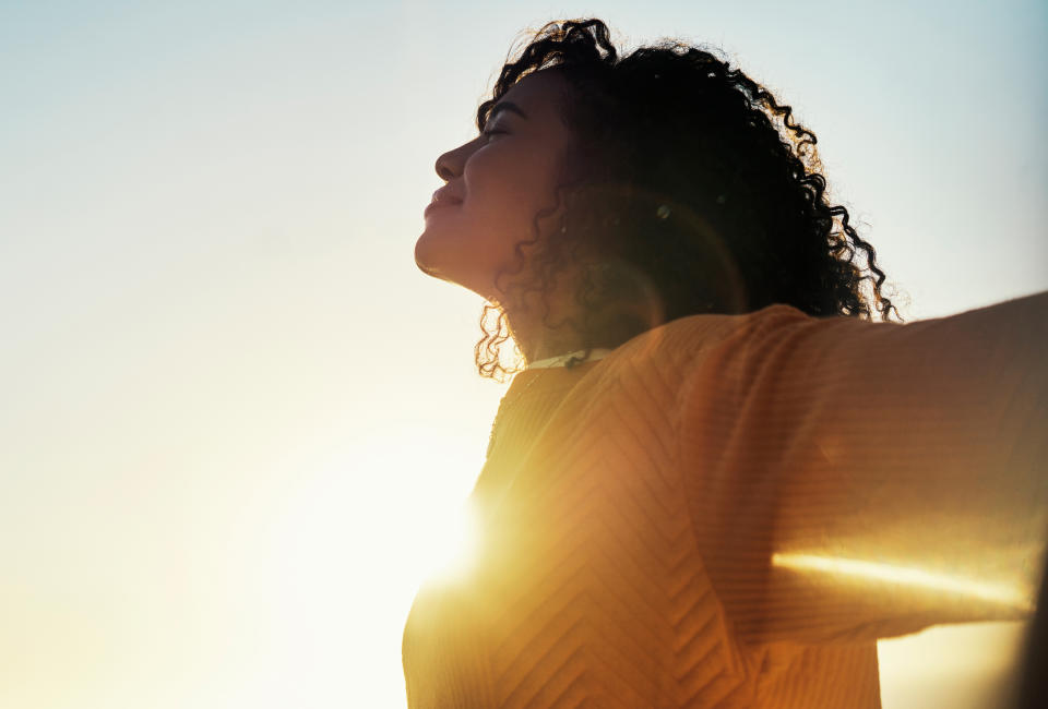 Woman breathing outside. (Getty Images)