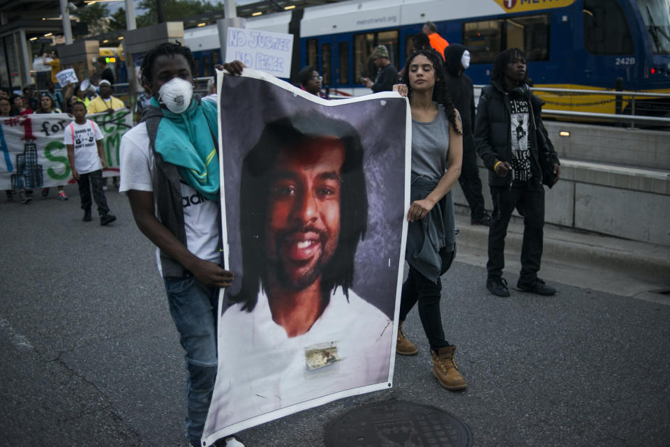 Protesters carry a portrait of Philando Castile on June 16, 2017 in St Paul, Minnesota. (Photo: Stephen Maturen via Getty Images)