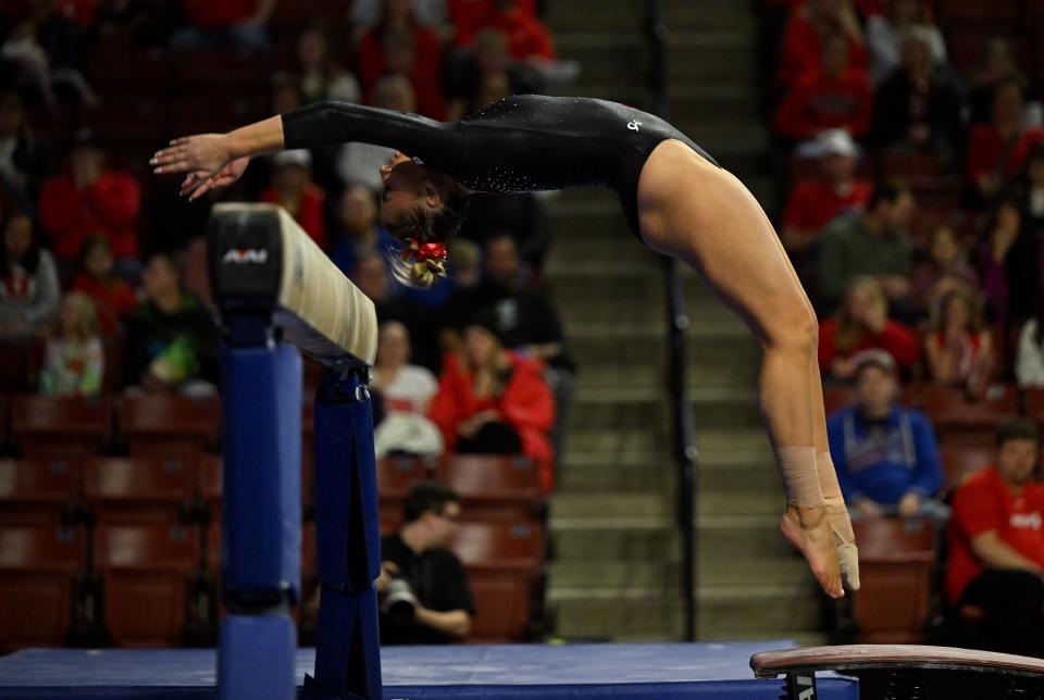 Utah’s Makenna Smith, begins her Beam routine as BYU, Utah, SUU and Utah State meet in the Rio Tinto Best of Utah Gymnastics competition at the Maverick Center in West Valley City on Monday, Jan. 15, 2024. | Scott G Winterton, Deseret News