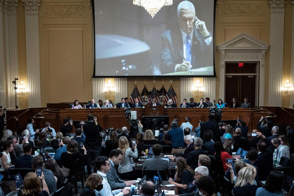 An image of former Vice President Mike Pence on the night of January 6, 2021 is displayed during the third hearing of the US House Select Committee to Investigate the January 6 Attack (POOL/AFP via Getty Images)