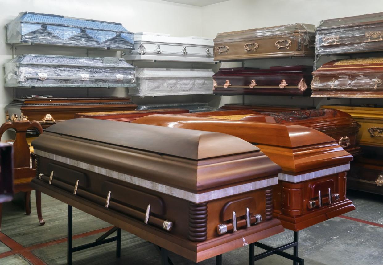 Assortment of coffins displayed in a coffin store in Oaxaca Mexico.