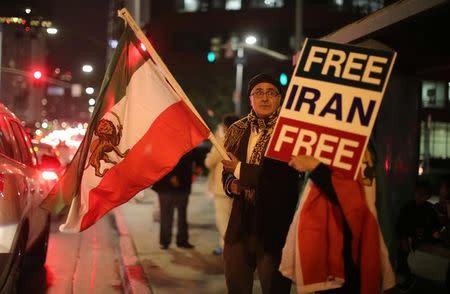 People protest in Los Angeles, California, U.S., in support of anti-government protesters in Iran, January 3, 2018. REUTERS/Lucy Nicholson