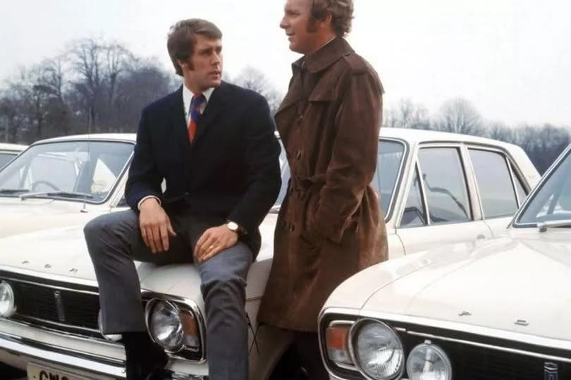 Geoff Hurst and Bobby Moore were pictured with the car in 1970 - it's now going up for auction