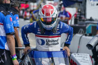 Graham Rahal climbs into his car during practice for the Indianapolis 500 auto race at Indianapolis Motor Speedway in Indianapolis, Friday, Aug. 14, 2020. (AP Photo/Michael Conroy)