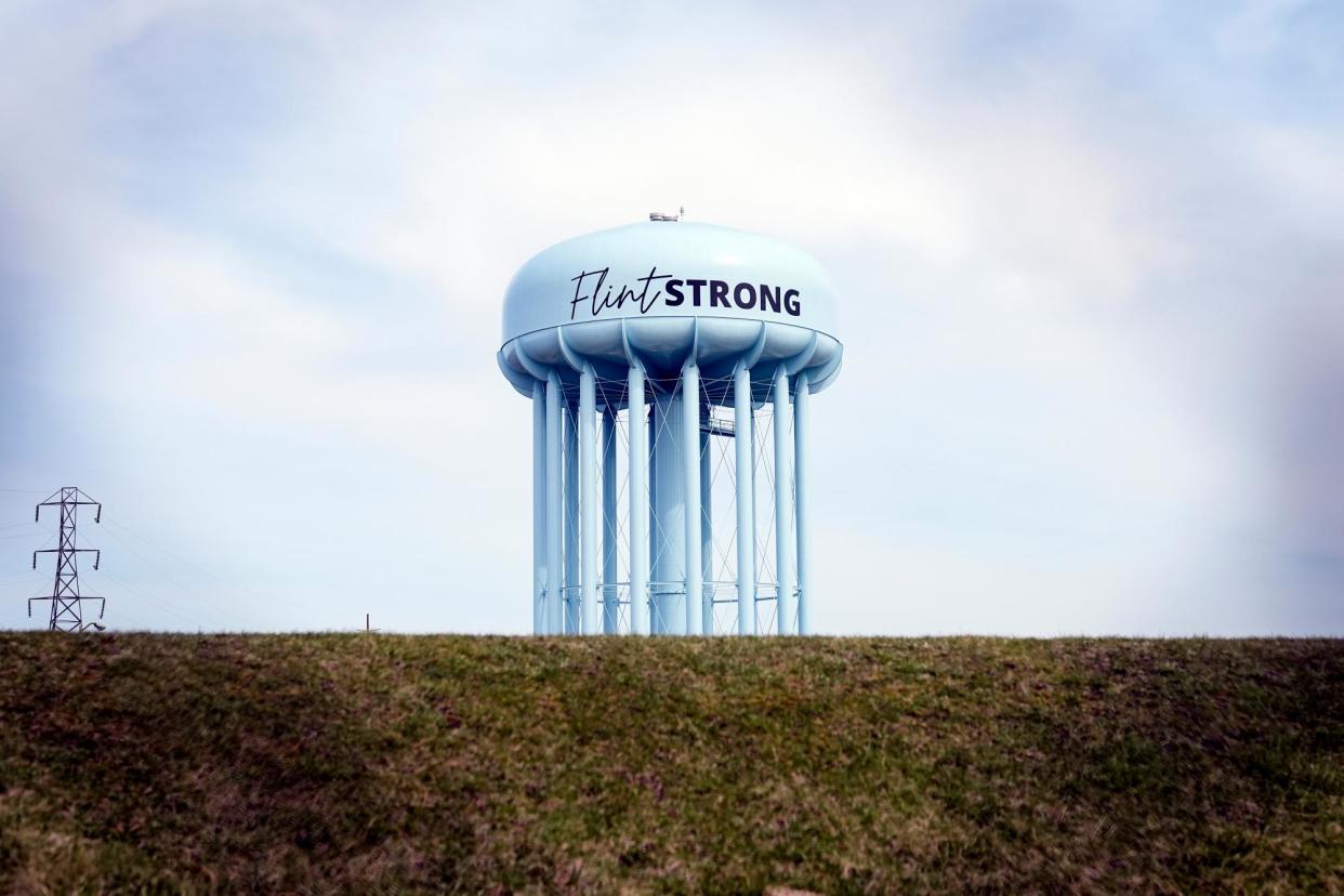 <span>The Flint water tower on 25 March 2024.</span><span>Photograph: Carlos Osorio/AP</span>