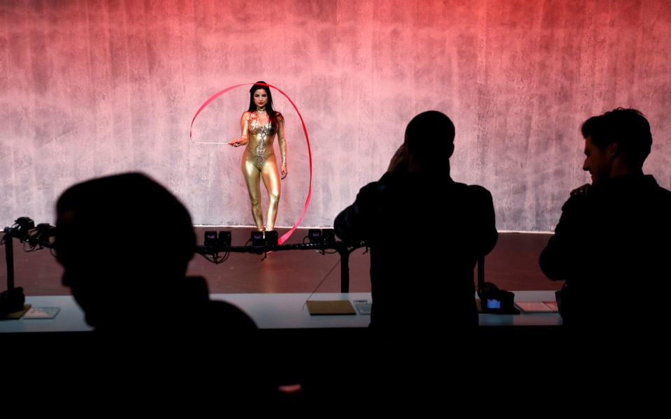 A model performs at a display for Sony cameras after a Sony news conference at CES International in Las Vegas in 2018. - AP