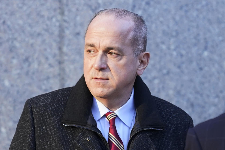 Ed Mullins leaves the courthouse in New York, Wednesday, Feb. 23, 2022. The former New York City police union president who's clashed with city officials over his insulting tweets and combative behavior was ordered released on $250,000 bail after pleading not guilty to a charge that he fraudulently took hundreds of thousands of dollars from the union. (AP Photo/Seth Wenig)