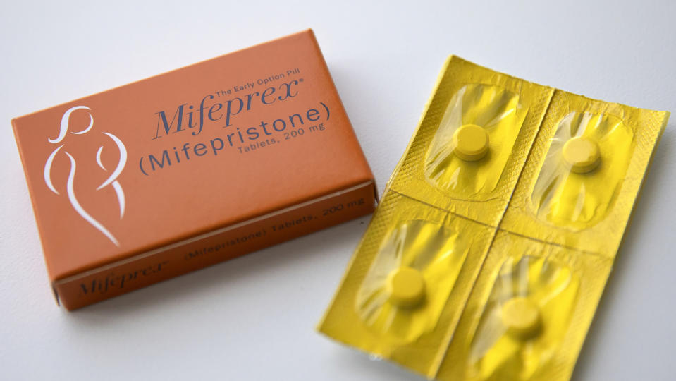 Mifeprex (Mifepristone) 200 mg tablets with blister pack containing four yellow pills