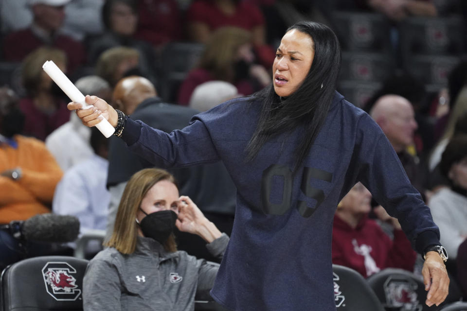 South Carolina head coach Dawn Staley calls for a substitution during the first half of an NCAA college basketball game against Texas A&M Thursday, Jan. 13, 2022, in Columbia, S.C. South Carolina won 65-45. (AP Photo/Sean Rayford)