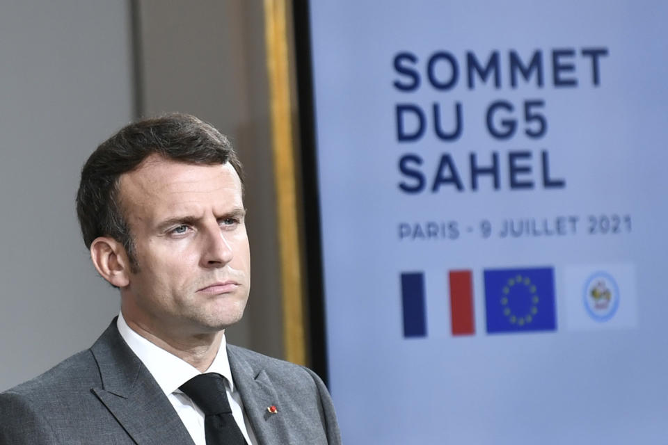 French President Emmanuel Macron attends a press conference after a video summit with leaders of G5 Sahel countries at the Elysee presidential Palace in Paris, Friday July 9, 2021. French President Emmanuel Macron said Friday his country will withdraw more than 2,000 troops from an anti-extremism force in Africa's Sahel region starting in the coming months. Macron announced last month a future reduction of France's military presence, arguing that the current operation is no longer adapted to the need. (Stephane de Sakutin, Pool photo via AP)