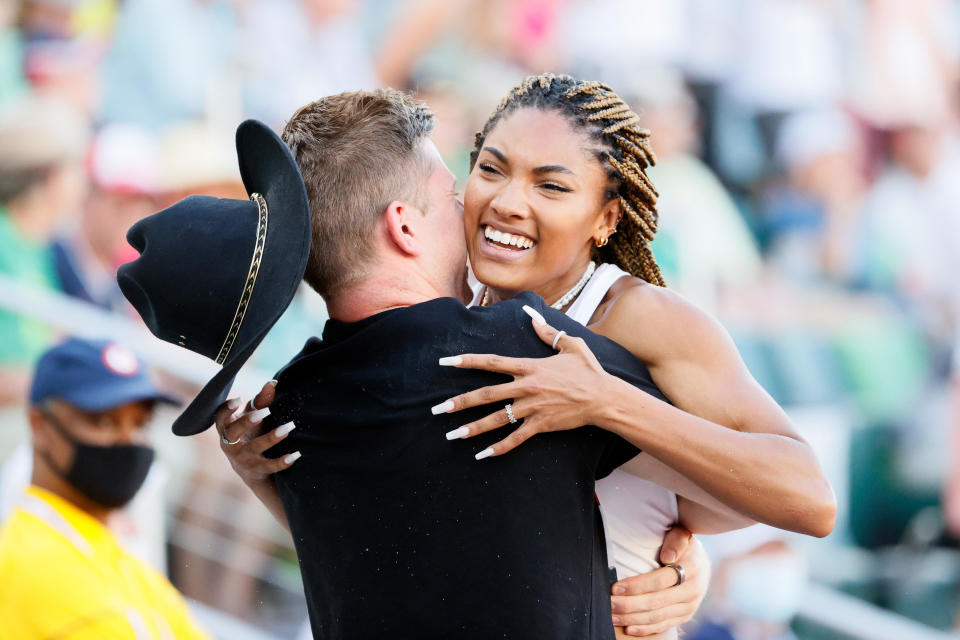 Tara Davis celebrates with Hunter Woodhall on day 9 of the 2020 U.S. Olympic Track & Field Team Trials at Hayward Field on June 26, 2021 in Eugene, Oregon.  / Credit: Steph Chambers/Getty Image