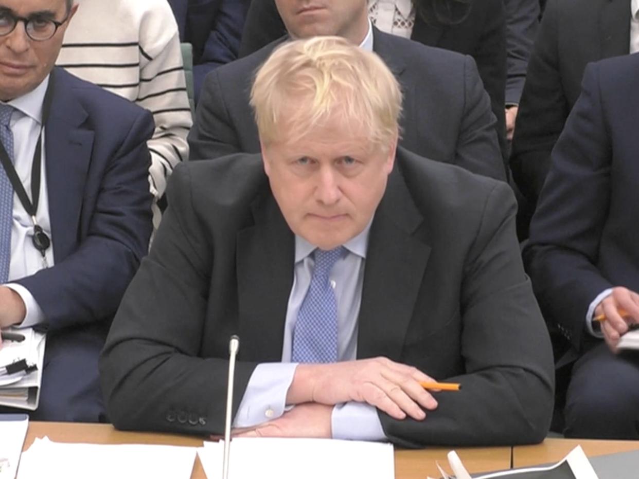 Johnson as Harman introduces the hearing (Reuters)