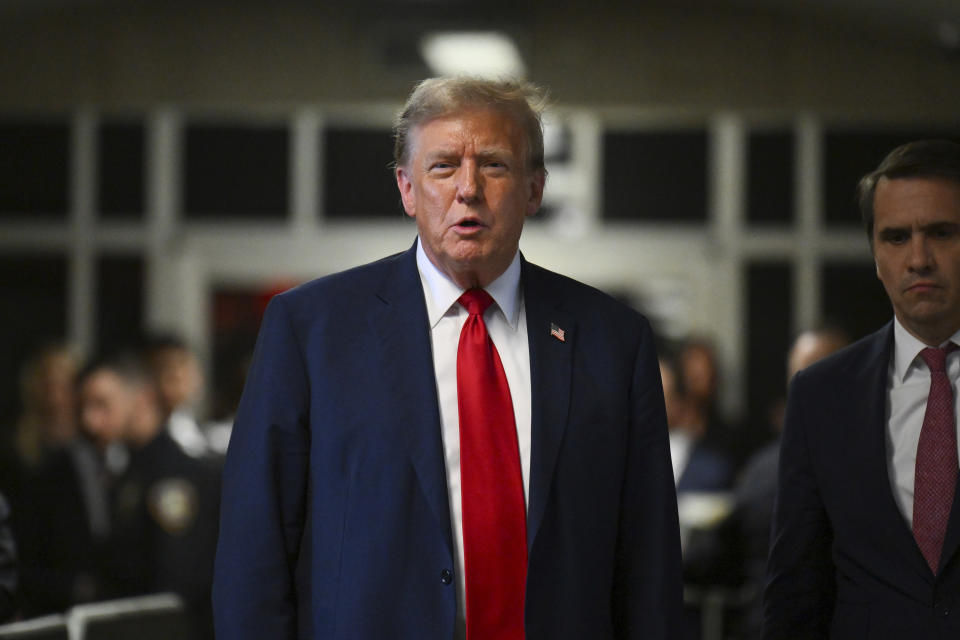 Former President Donald Trump speaks to the press in Manhattan state court in New York, Monday, April 15, 2024, after the first day of his trial over charges that he falsified business records to conceal money paid to silence porn star Stormy Daniels in 2016. (Angela Weiss/Pool Photo via AP)