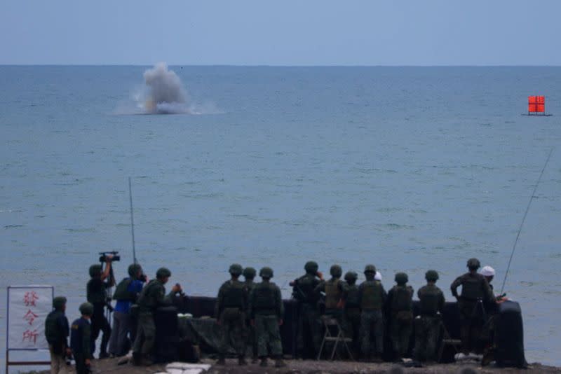 Military officals observe a target shooting live fire exercise with US-made TOW 2A missile in Pingtung,