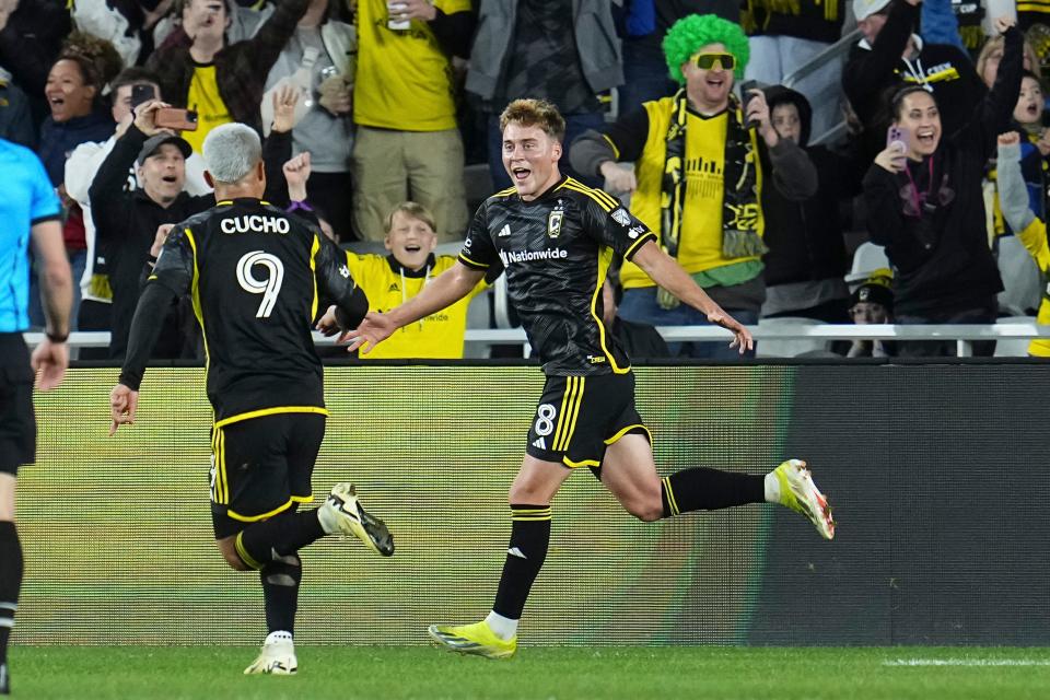 Mar 16, 2024; Columbus, Ohio, USA; Columbus Crew midfielder Aidan Morris (8) celebrates a goal with forward Cucho Hernandez (9) during the second half of the MLS soccer match against the New York Red Bulls at Lower.com Field. Mandatory Credit: Adam Cairns-USA TODAY Sports
