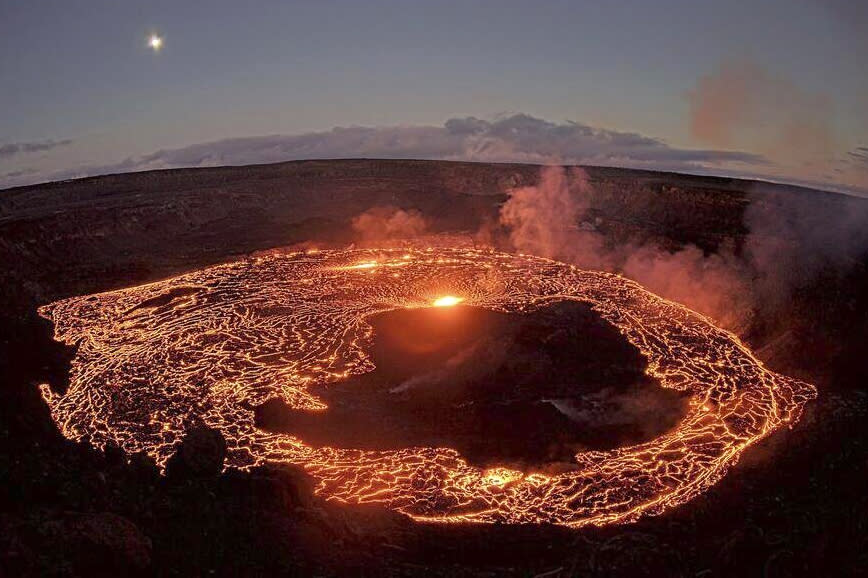 This webcam image provided by the U.S. Geological Survey shows Hawaii’s Kilauea volcano, from the west rim of the summit caldera, looking east, Thursday, Jan. 5, 2023. Hawaii's Kilauea began erupting inside its summit crater Thursday, the U.S. Geological Survey said, less than one month after the volcano and its larger neighbor Mauna Loa stopped releasing lava. ( U.S. Geological Survey via AP) (U.S. Geological Survey via AP)