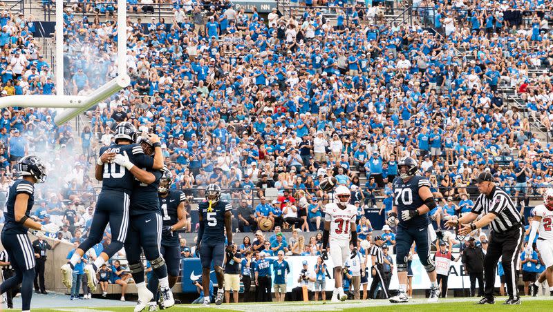 BYU quarterback Kedon Slovis (10) celebrates his touchdown with teammates during game against Southern Utah at LaVell Edwards Stadium in Provo on Saturday, Sept. 9, 2023. The former USC and Pitt QB has fit in well in Provo — both on and off the field.