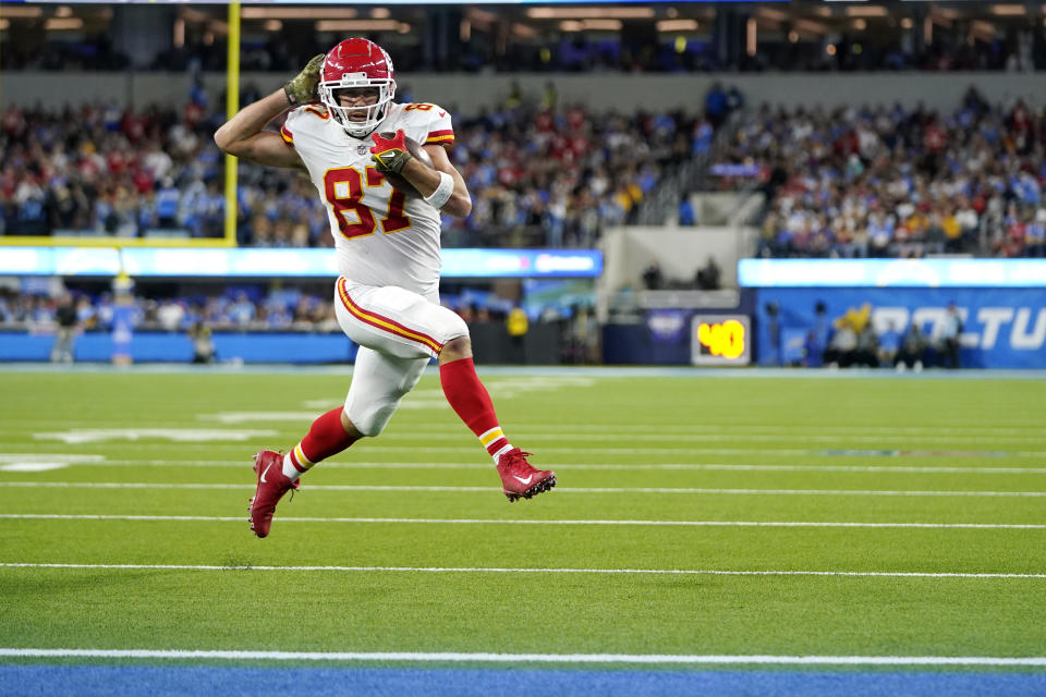 Kansas City Chiefs tight end Travis Kelce runs in for a touchdown during the first half of an NFL football game against the Los Angeles Chargers Sunday, Nov. 20, 2022, in Inglewood, Calif. (AP Photo/Jae C. Hong)