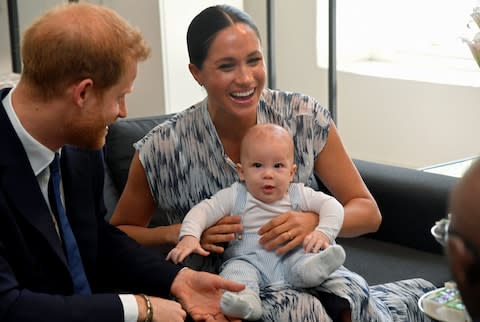 Archie meets the Arch: The Duke and Duchess of Sussex and their son meet Desmond Tutu - Credit: TOBY MELVILLE&nbsp;/Reuters