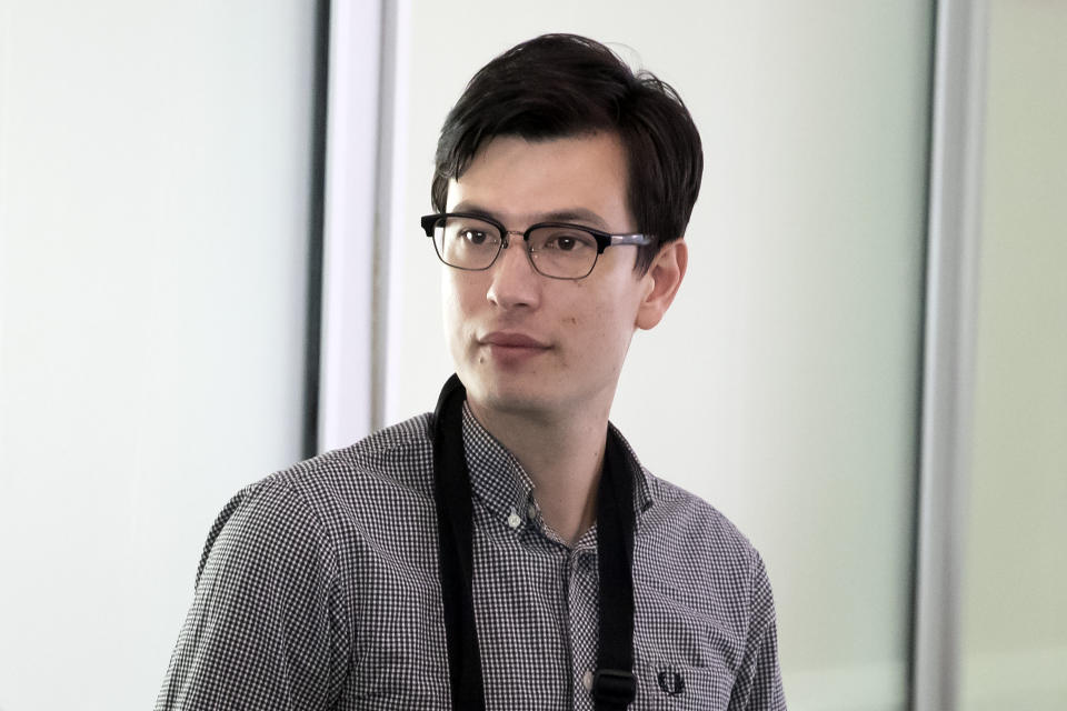 Australian student Alek Sigley arrives at Beijing Capital International Airport in Beijing, Thursday, July 4, 2019. Sigley was released after a week in detention in North Korea described his condition to reporters in Beijing on Thursday as "very good," without saying what happened. (AP Photo/Mark Schiefelbein)