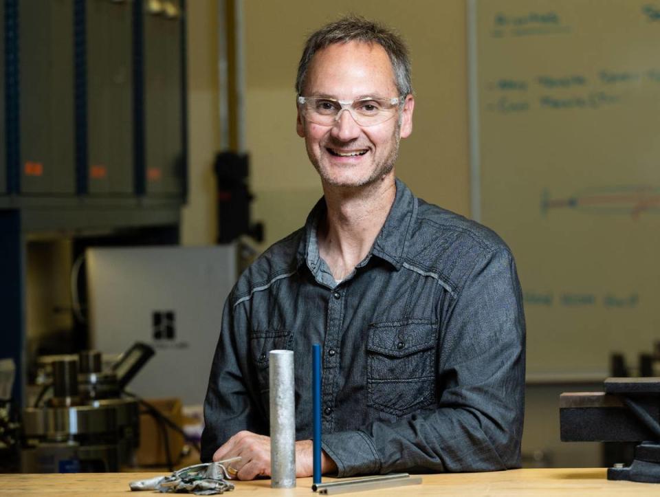 Scott Whalen and his colleagues at PNNL use Shear Assisted Processing and Extrusion (ShAPE)™ to transform post-consumer aluminum scrap into strong, lightweight tubes and wires, as well as other useful products. Photo by Andrea Starr | Pacific Northwest National Laboratory