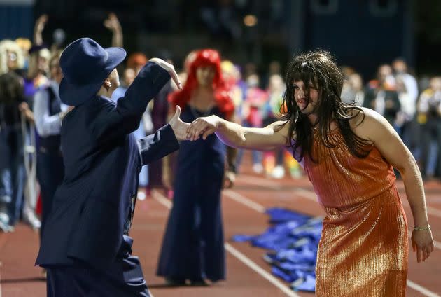 Students and faculty participate in the “drag ball