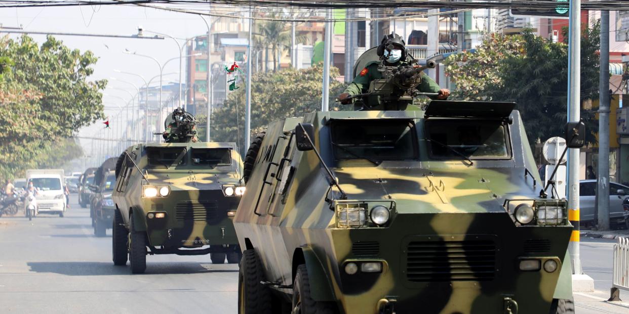 Armoured personnel carriers are seen on the streets of Mandalay on February 3, 2021, as calls for a civil disobedience gather pace following a military coup which saw civilian leader Aung San Suu Kyi being detained. (Photo by STR / AFP) (Photo by STR/AFP via Getty Images)