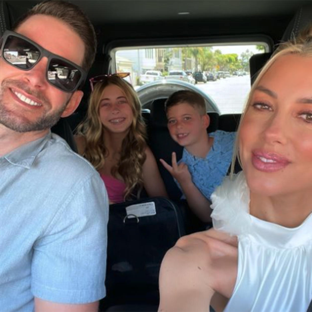 Tarek and Heather Rae El Moussa, along with his kids, Taylor and Brayden, on their way to the gender reveal party. (heatherraeyoung via Instagram)
