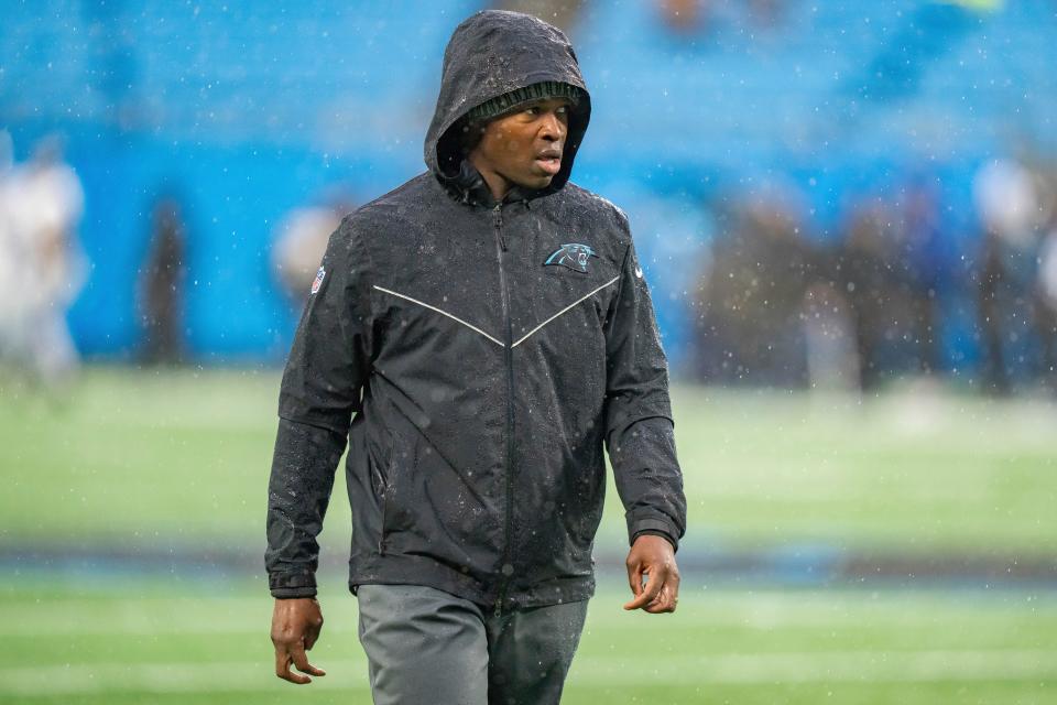 Carolina Panthers defensive coordinator Ejiro Evero looks on before an NFL football game against the Atlanta Falcons Sunday, Dec. 17, 2023, in Charlotte, N.C. (AP Photo/Jacob Kupferman)