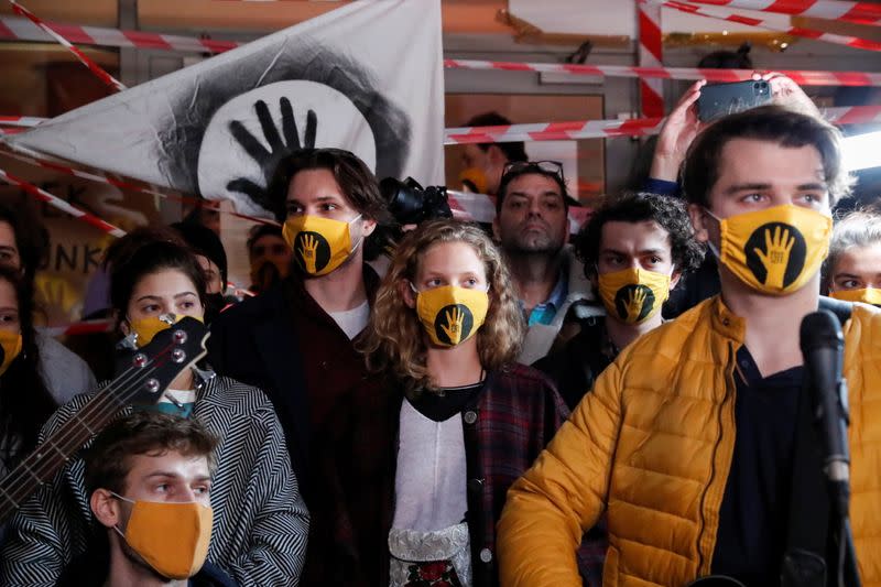 Students sing in front of the University of Theatre and Film Arts after the Chancellor, in Budapest