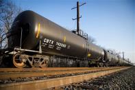 A crude oil train sits parked outside the Philadelphia Energy Solutions refinery owned by the Carlyle Group in south Philadelphia March 20, 2014. REUTERS/David M. Parrott