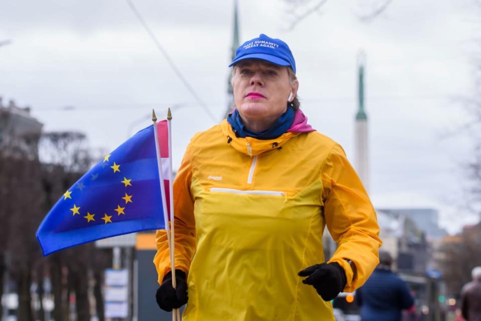 <div class="inline-image__caption"><p>Eddie Izzard, English stand-up comic, actor, writer, and political activist runs an 18th marathon distance in a row (part of a project to run 28 marathons in 28 days and 28 countries) with the slogan “MakeHumanityGreatAgain” in Riga, Latvia on Feb. 18, 2020.</p></div> <div class="inline-image__credit">Gints Ivuskans/AFP via Getty Images</div>