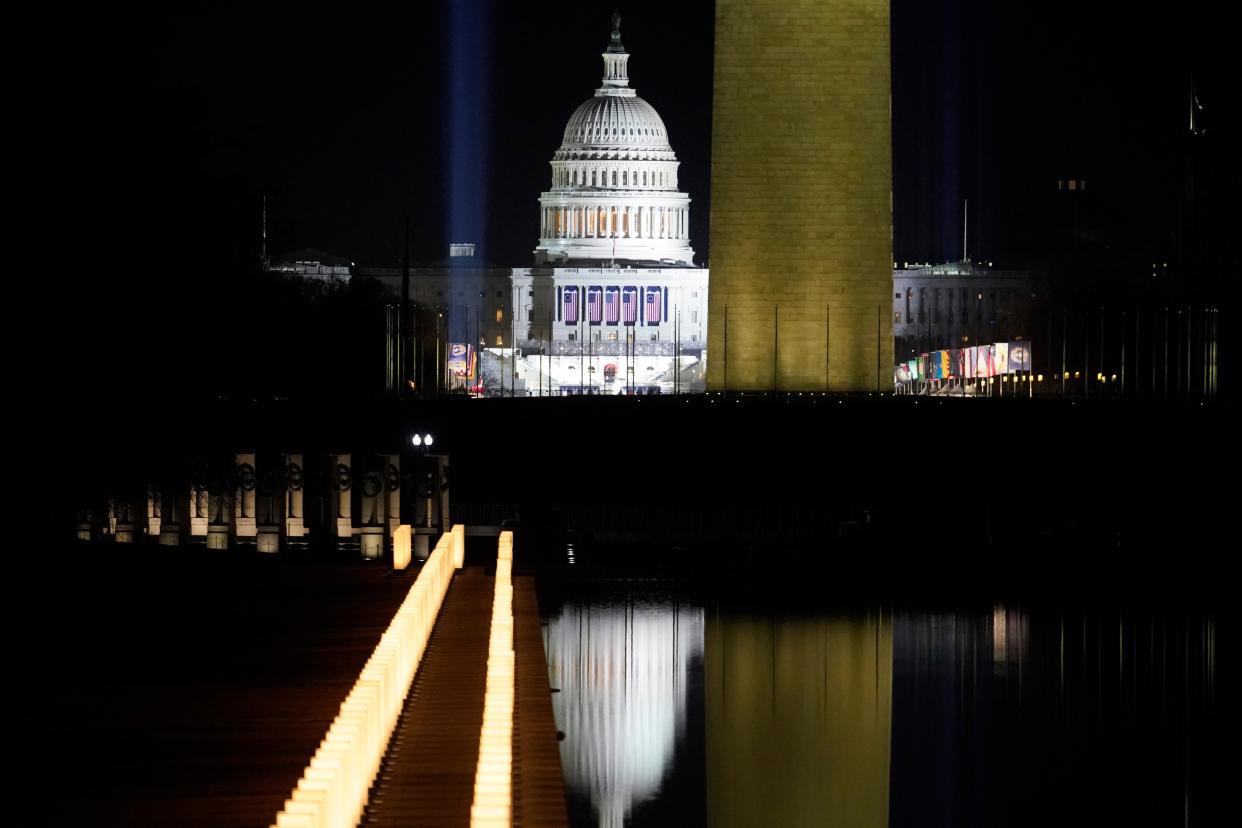 <p>The US Capitol Building is reflected in the Lincoln Memorial Reflecting Pool during a televised ceremony on January 20, 2021 in Washington, DC</p> (Getty Images)