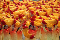 Participants march during the celebration to commemorate the 70th anniversary of the founding of Communist China in Beijing, Tuesday, Oct. 1, 2019. (AP Photo/Ng Han Guan)