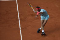 Spain's Rafael Nadal plays a shot against Sebastian Korda of the U.S. in the fourth round match of the French Open tennis tournament at the Roland Garros stadium in Paris, France, Sunday, Oct. 4, 2020. (AP Photo/Alessandra Tarantino)
