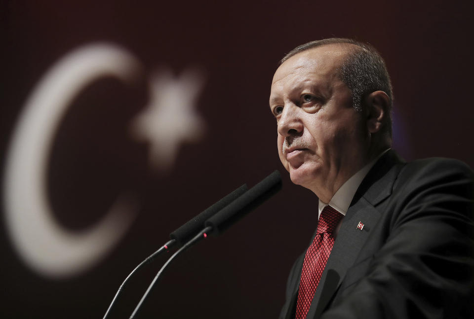 In this photo taken on Friday, July 5, 2019, Turkey's President Recep Tayyip Erdogan speaks during a meeting in Istanbul. Erdogan has fired the Central Bank Governor Murat Cetinkaya amid the country's economic downturn. Cetinkaya was replaced by Murat Uysal, the deputy governor, in a presidential decree published Saturday.(Presidential Press Service via AP, Pool)