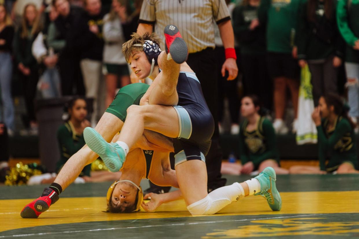 The Great Falls High and CMR wrestling teams squared off in a dual Tuesday at CMR Fieldhouse. The Bison took a close victory in the rivalry 40-33.