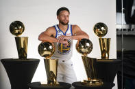 Golden State Warriors guard Stephen Curry poses for a photograph during an NBA basketball media day in San Francisco, Sunday, Sept. 25, 2022. (AP Photo/Godofredo A. Vásquez)