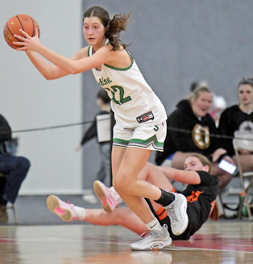 Sutton's Claire Acocelli emerges with control of a rebound.