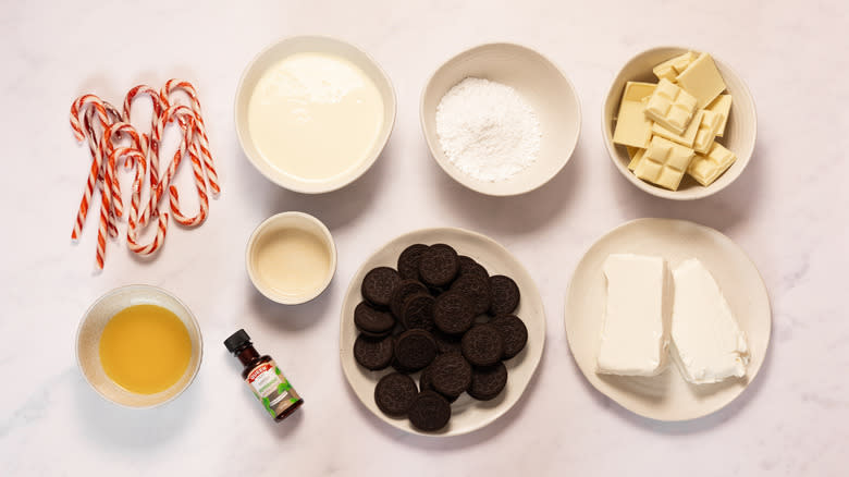candy cane cheesecake ingredients on marble counter