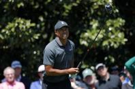 Tiger Woods of the U.S. watches his drive off the 9th tee during first round play of the 2018 Masters golf tournament at the Augusta National Golf Club in Augusta, Georgia, U.S., April 5, 2018. REUTERS/Brian Snyder