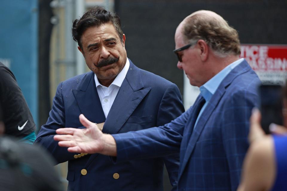 Jaguars owner Shad Khan (L) and team president Mark Lamping must be prepared for long, hard negotiations on a potential $2 billion deal with the city of Jacksonville when trying to reaching an agreement on a TIAA Bank Field renovation deal and building a mixed-use neighborhood around the stadium.