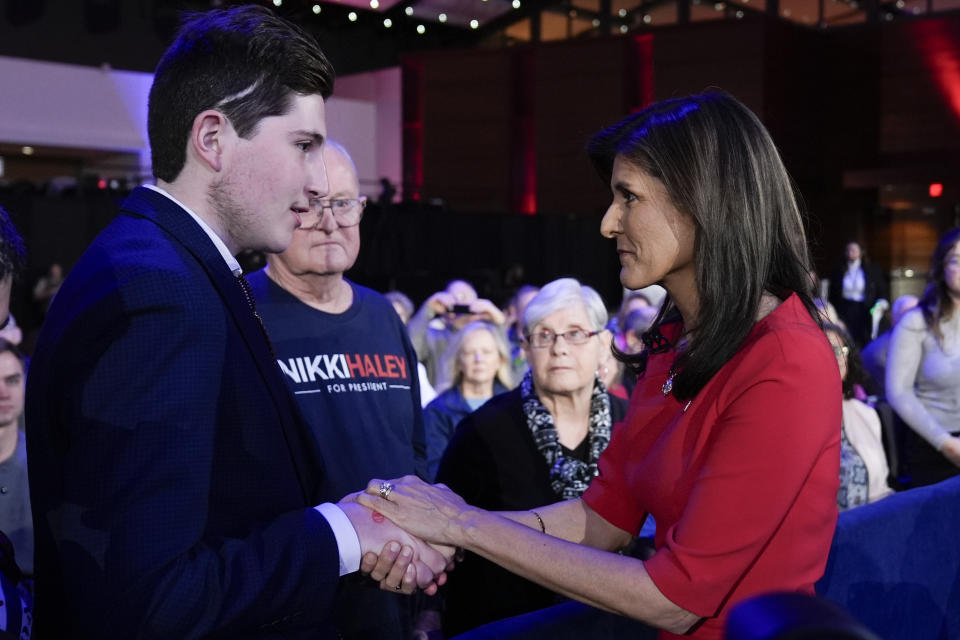 Republican presidential candidate former UN Ambassador Nikki Haley talks to a attendee during a Fox News Town Hall, Monday, Jan. 8, 2024, in Des Moines, Iowa. (AP Photo/Charlie Neibergall)