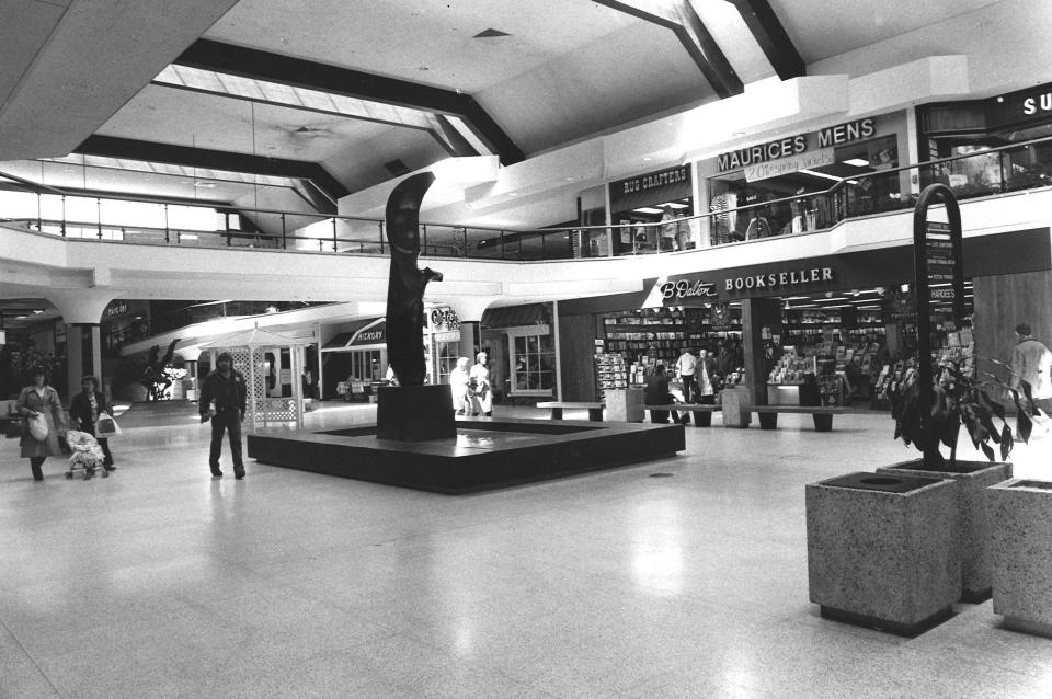 From 1982: Recognizable stores at Merle  Hay Mall include B. Dalton Bookseller, Rug Crafters, Maurices Mens, The Children's Shop, Hickory Farms and, at far left, Music Den.